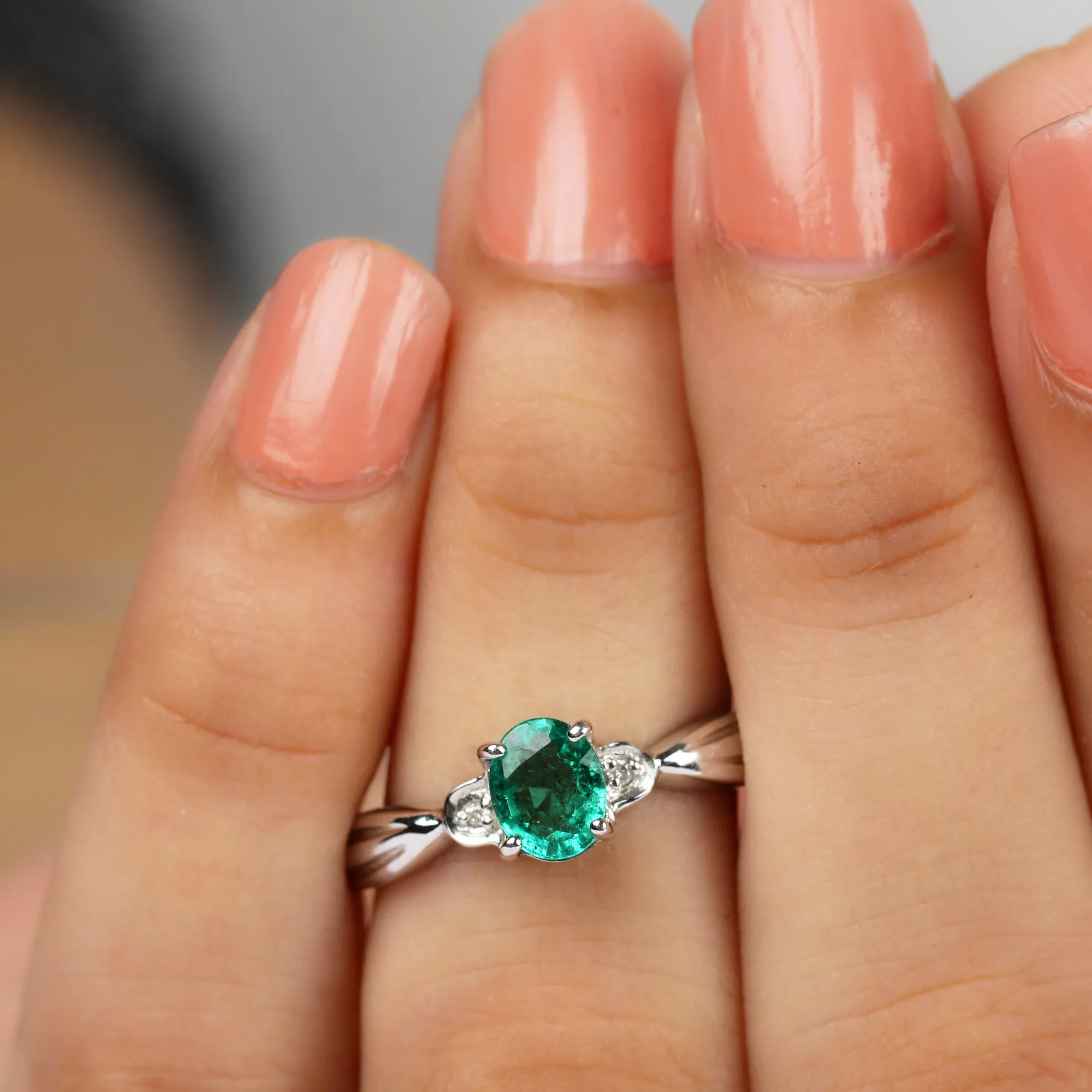 Oval Emerald Solitaire Ring with Diamond