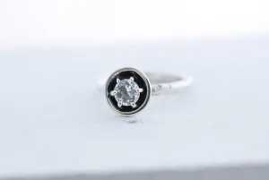 Silver engagement ring with clear white topaz